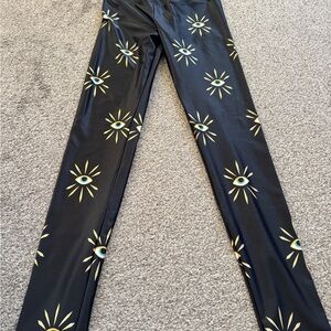 Goldsheep Black Leggings with Gold Eye Pattern